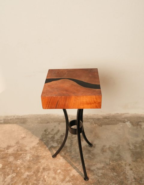 Walnut service table with square black risen